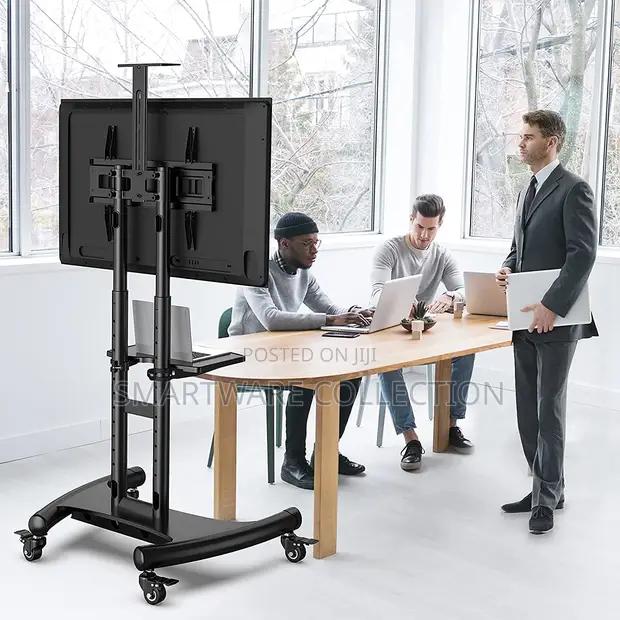 32-75 Inches Tv Bracket Movable Tv Stand Rack Floor Machine in Dar es Salaam, Tanzania