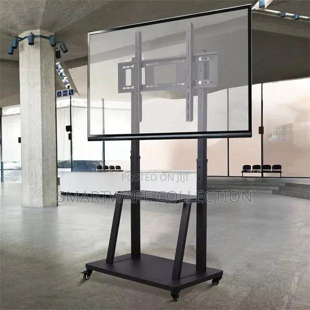 32-75 Mobile TV Floor Stand With Mount Shelves 4 Wheels in Dar es Salaam, Tanzania
