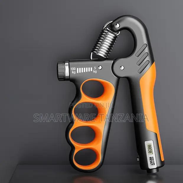 Orange Adjustable Hand Grip 5-100kg Strength Trainer in Dar es Salaam, Tanzania