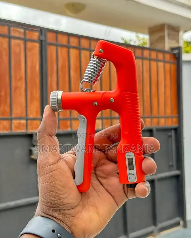 Red Hand Grip Strengthener Adjustable 10-100kg Lcd Counter in Dar es Salaam, Tanzania